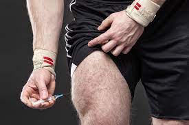 Man injecting steroids